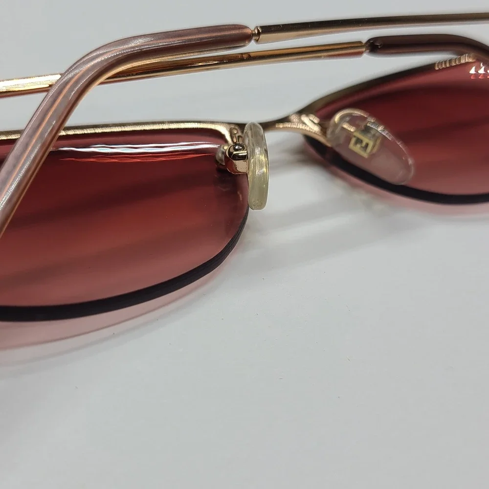 Fendi Pink Lens Rimless Sunglasses with Gold Frame